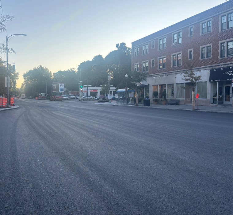 A newly repaved area of Sherbrooke Street West