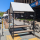 A paklet installed street-side on Greene Avenue