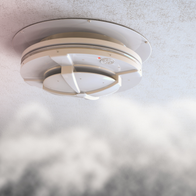 Un détecteur de fumée monté au plafond