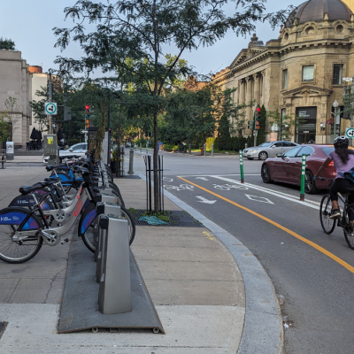 View of a bixi station along a bike path in Westmount