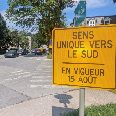 street sign indicating a one-way street