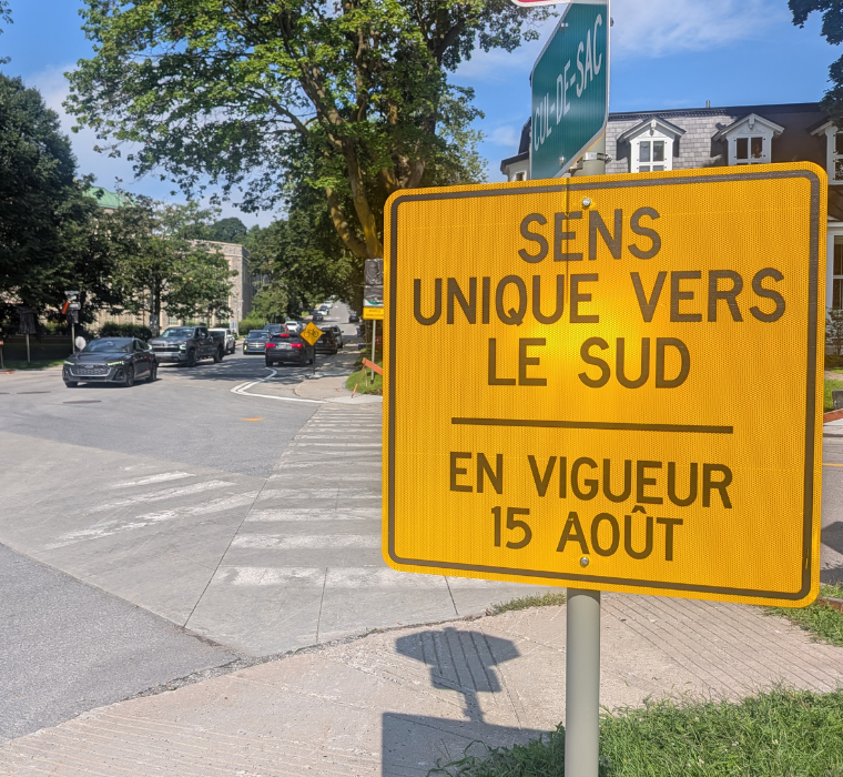 street sign indicating a one-way street