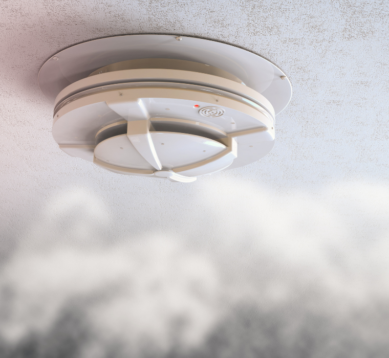 A ceiling-mounted smoke detector
