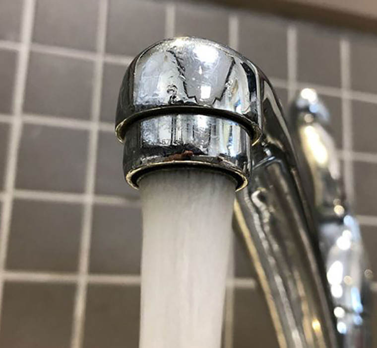 water coming out of the faucet