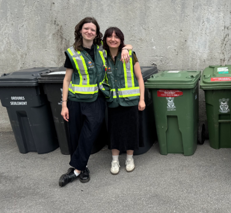 Two green patrol officiers in front of collections